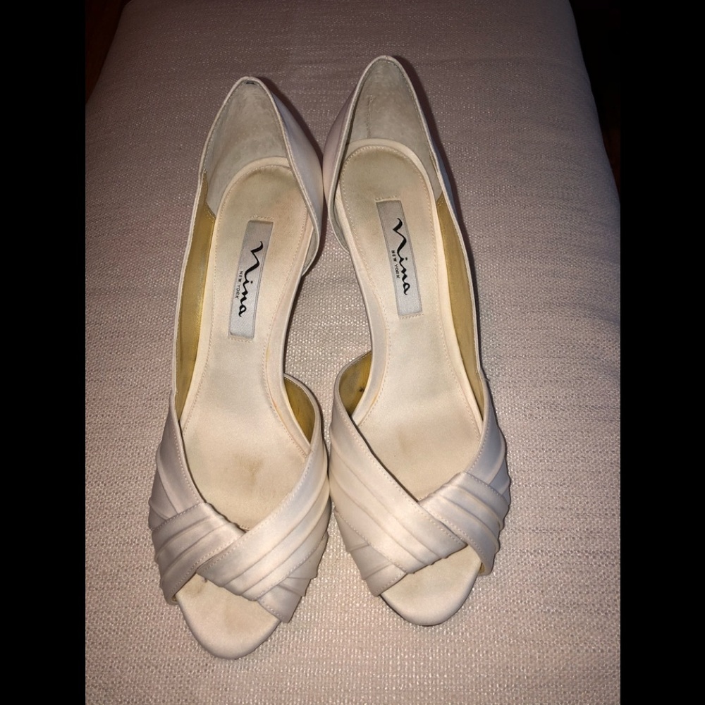 Nina white satin heels.